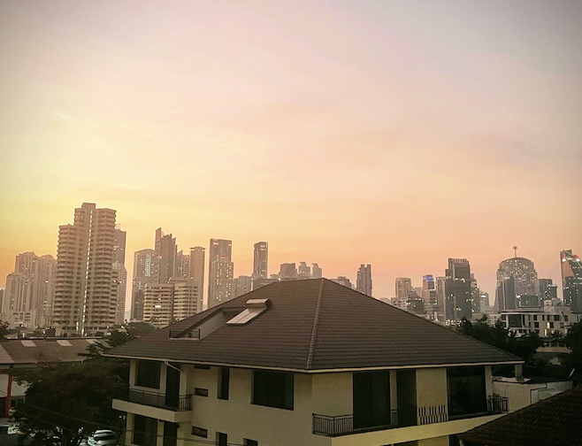 RoomQuest Sukhumvit 36 balcony sunset view