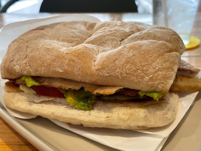 Vegano vegan chicken and guacamole sandwich