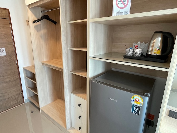 Snow House Buriram standard room storage space