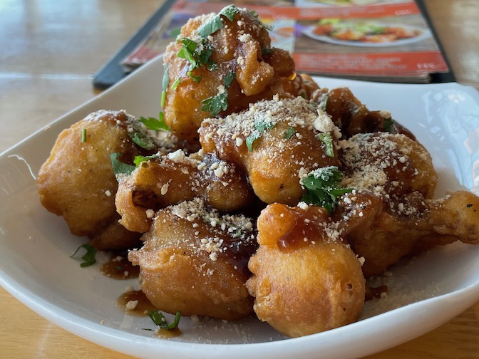 Huahin Vegan glazed cauliflower with vegan parmesan cheese