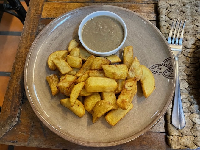 Chips and vegan gravy at New Leaf Eatery